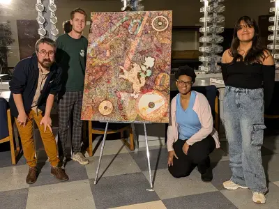 A group photo of artists participating in the F O O L project.